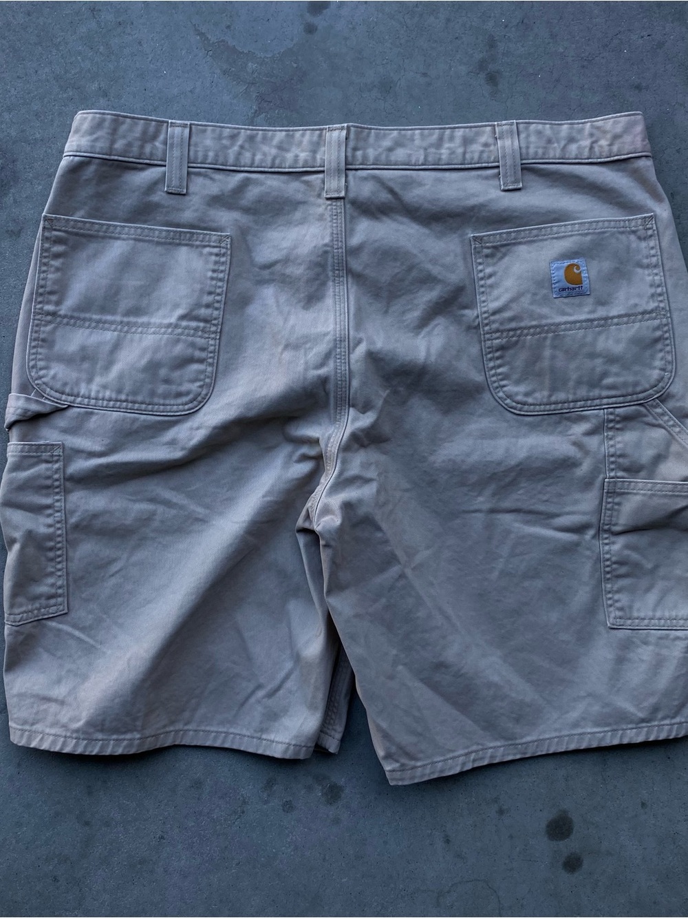 Baggy Carhartt beige canvas shorts with a  relaxed fit